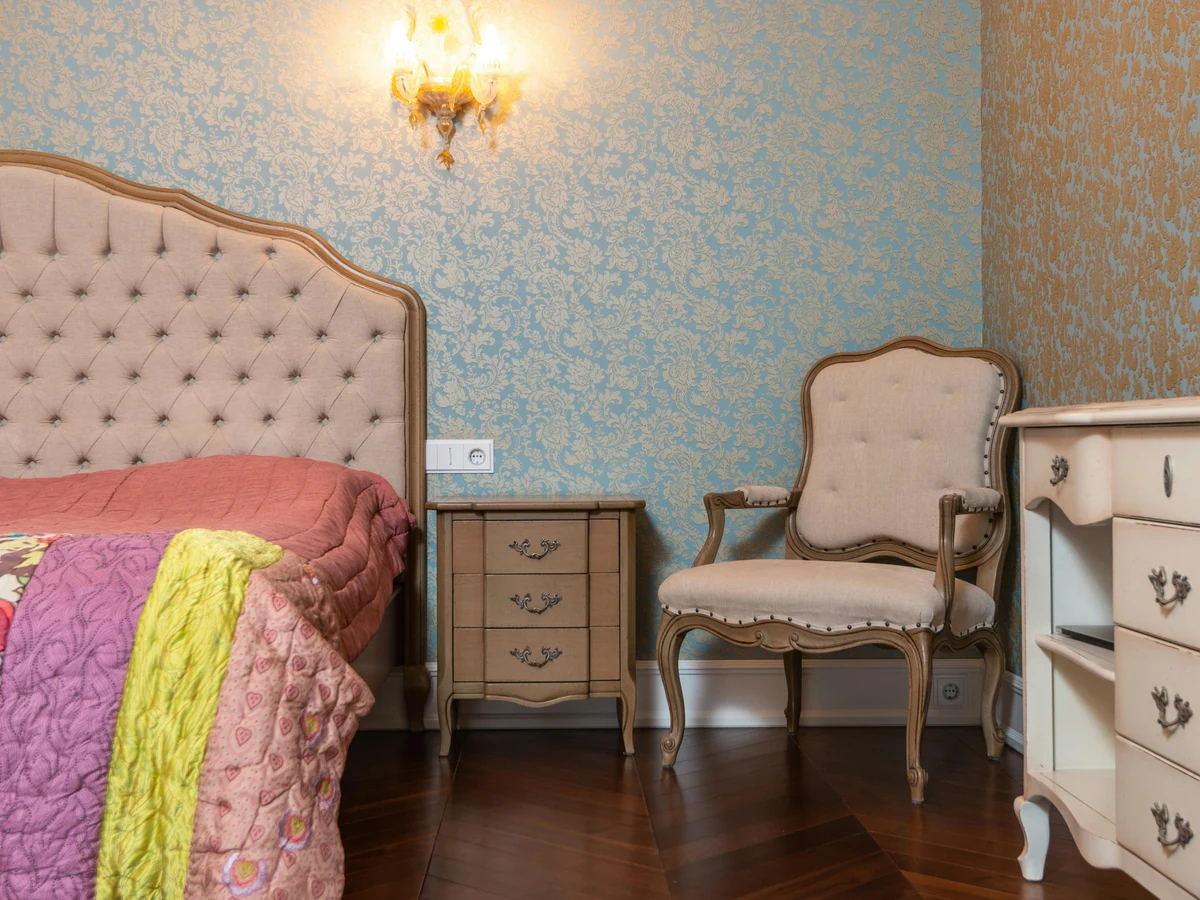 Bedroom with grey accent feature wall painted by Sheffield Decorators