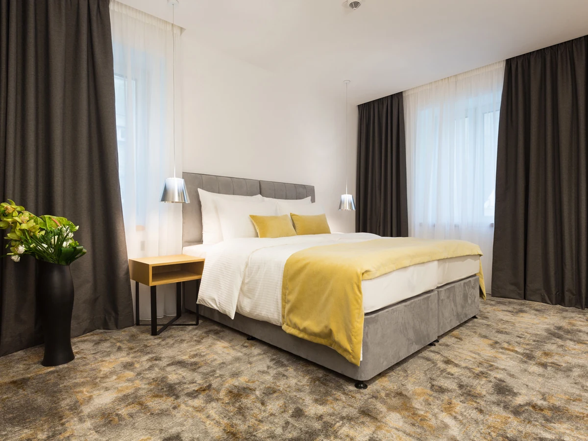 Hotel style bedroom painting Sheffield, professionally painted neutral tones by Sheffield Decorators