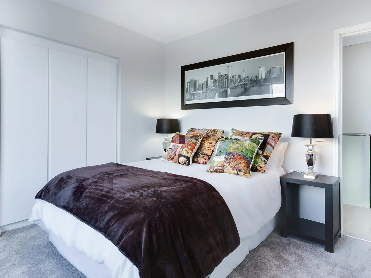 Modern white bedroom painting Sheffield, clean contemporary finish by Sheffield Decorators