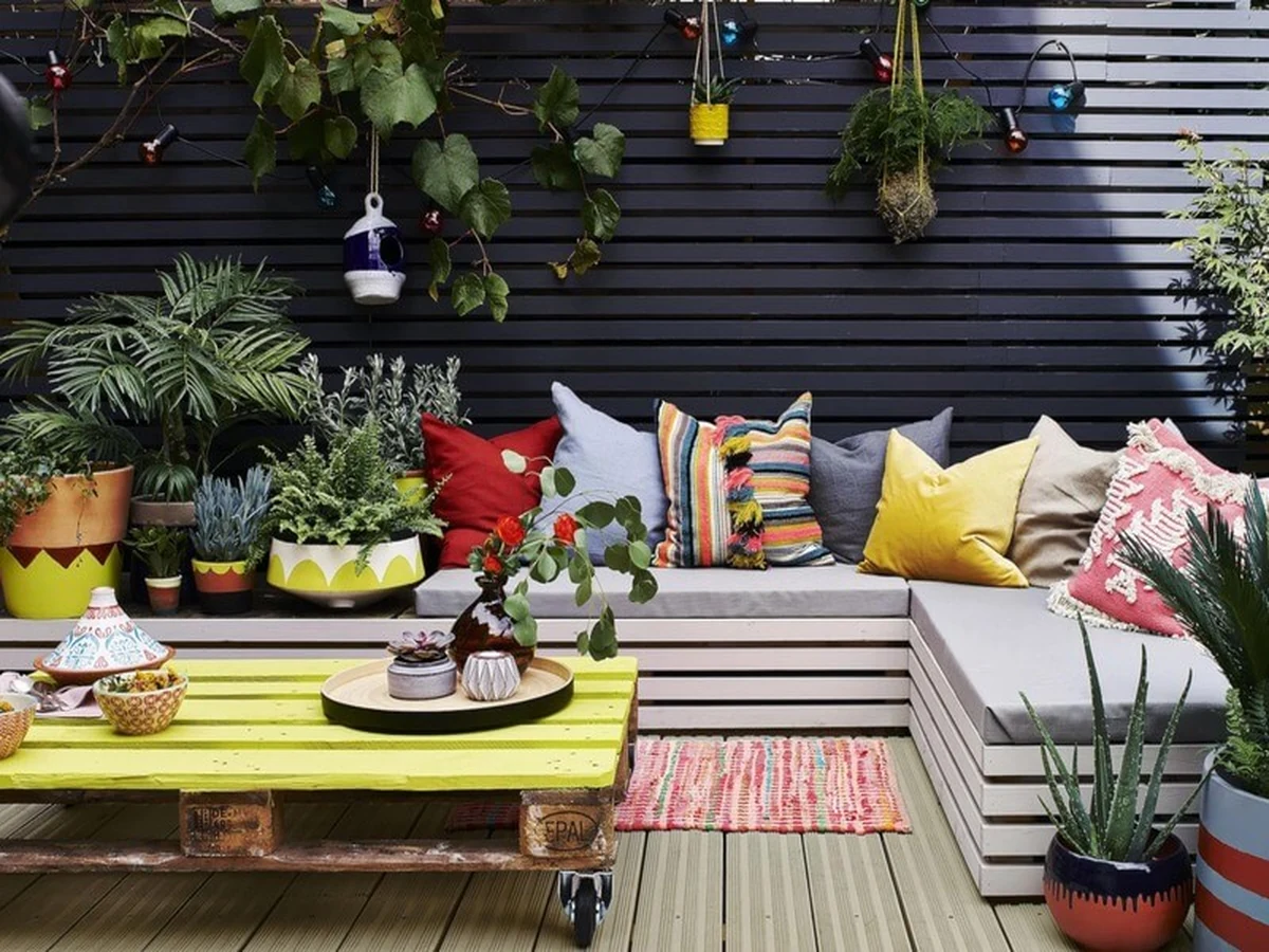 Colourful garden patio deck painting in Sheffield by Sheffield Decorators, vibrant outdoor finish