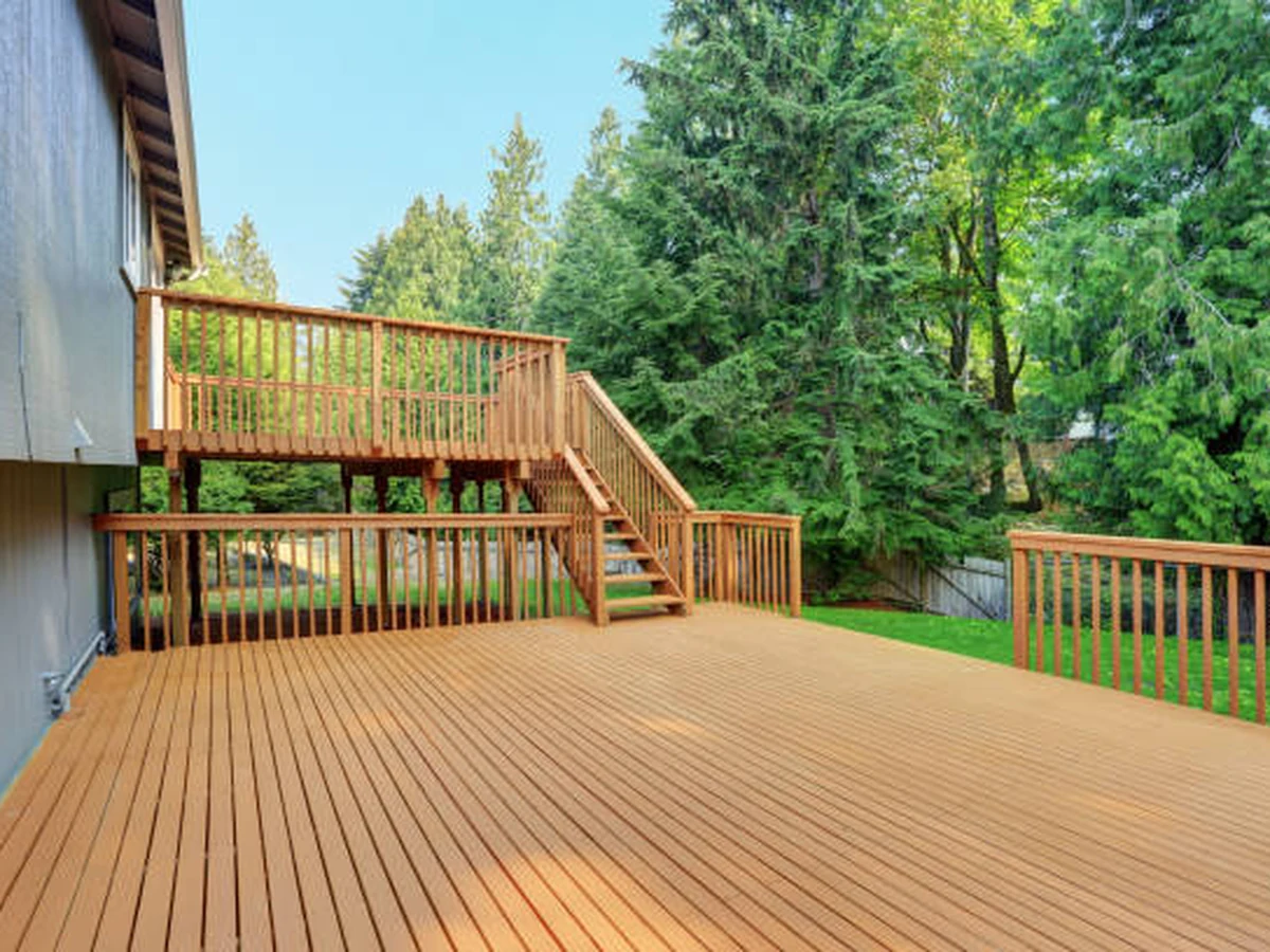 Deck painting in Sheffield by Sheffield Decorators, large elevated wooden deck with fresh coating applied