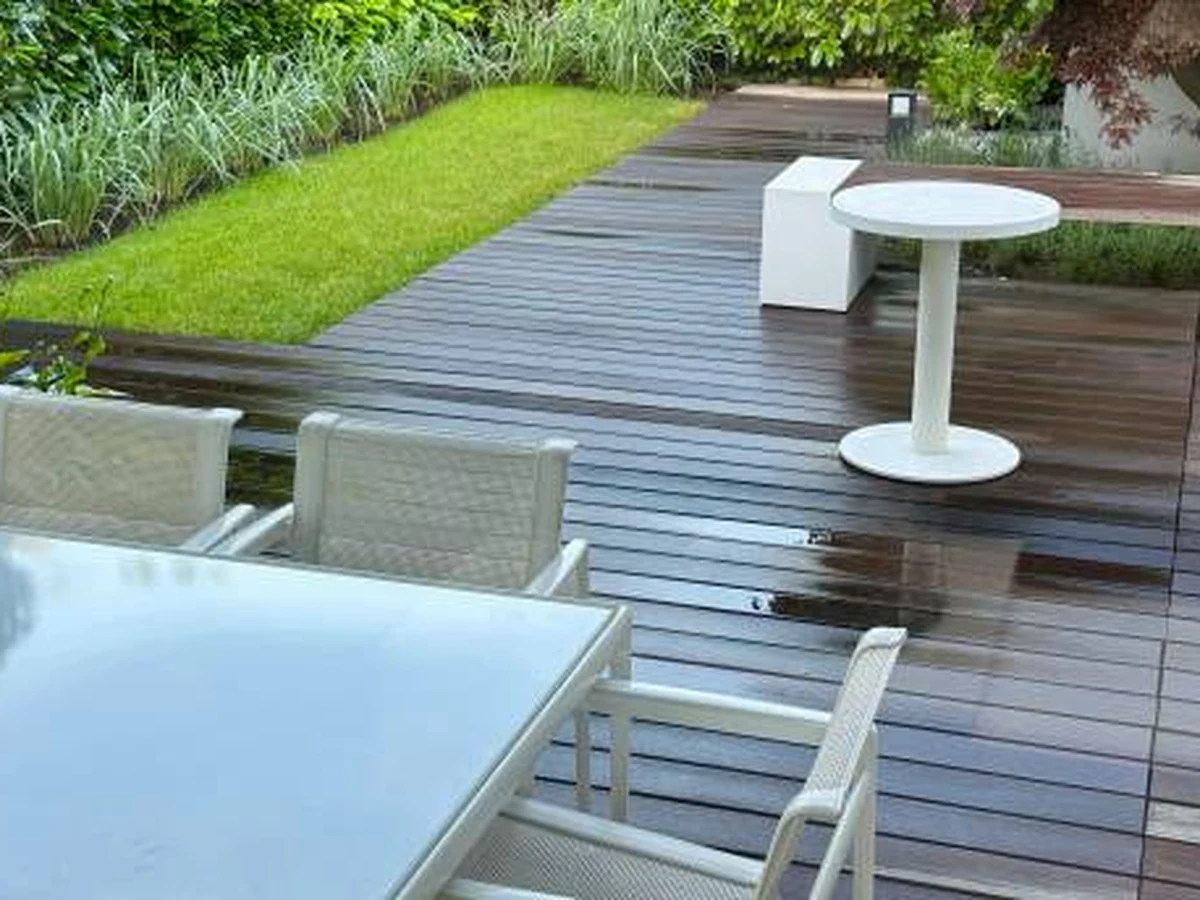 Modern garden deck painting in Sheffield, freshly painted timber boards by Sheffield Decorators