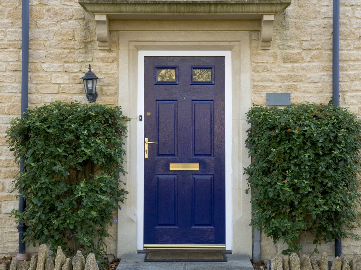Navy blue front door painting by Sheffield Decorators