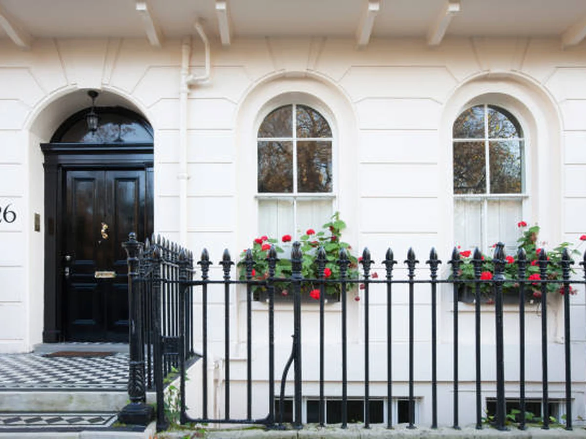 White Georgian townhouse with painted window frames in Sheffield