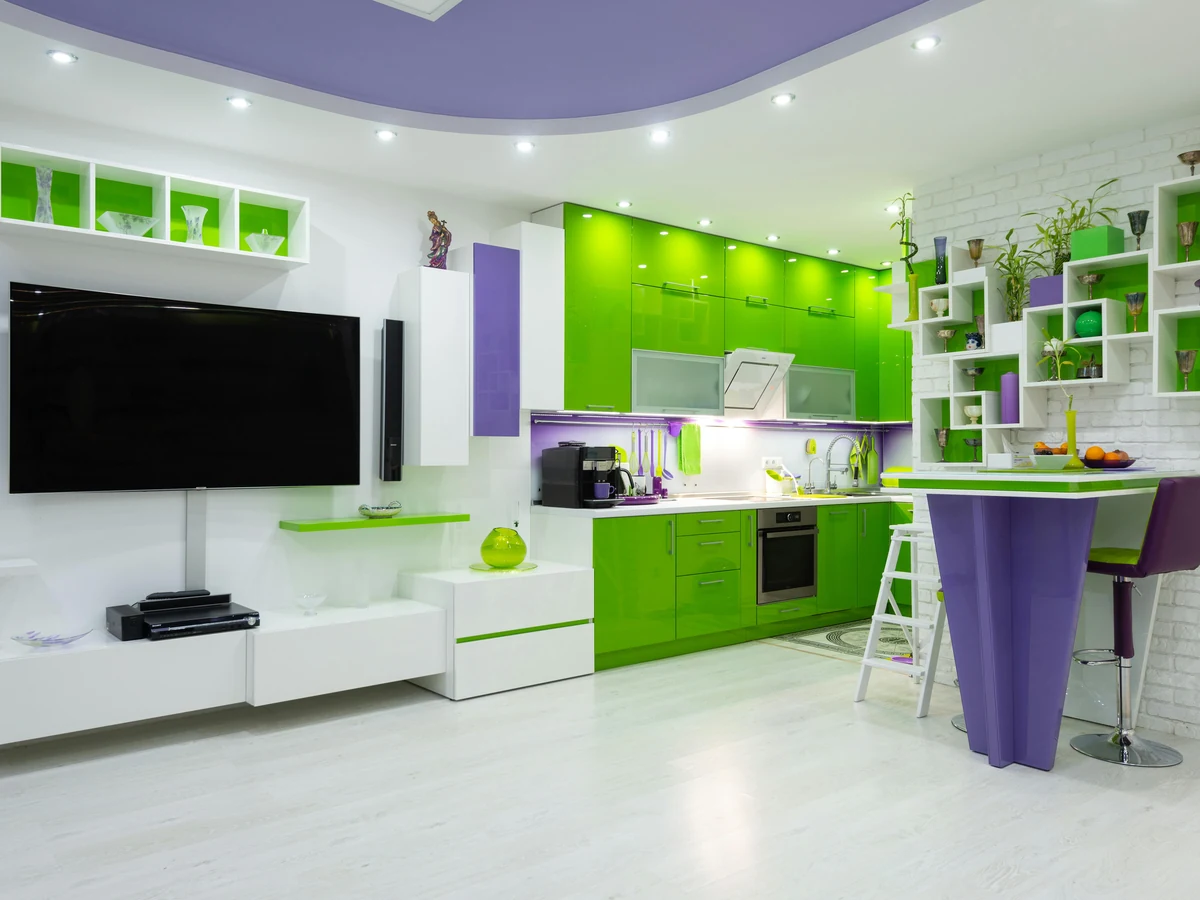 Bold green and purple kitchen cabinet painting in Sheffield by Sheffield Decorators