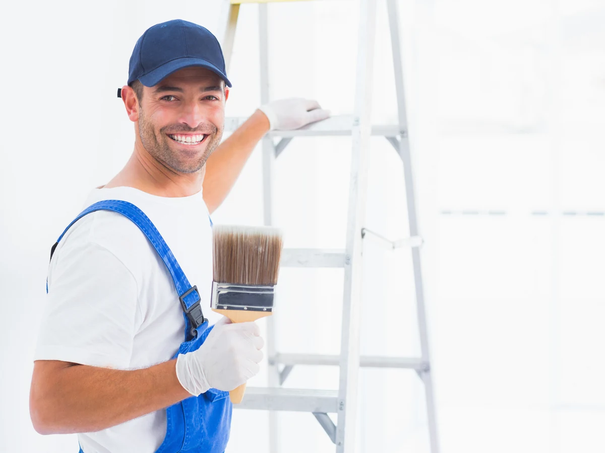 painting-decorating-smiling-painter-holding-sheffield-decorators Sheffield Decorators painter ready to start a job in Penistone