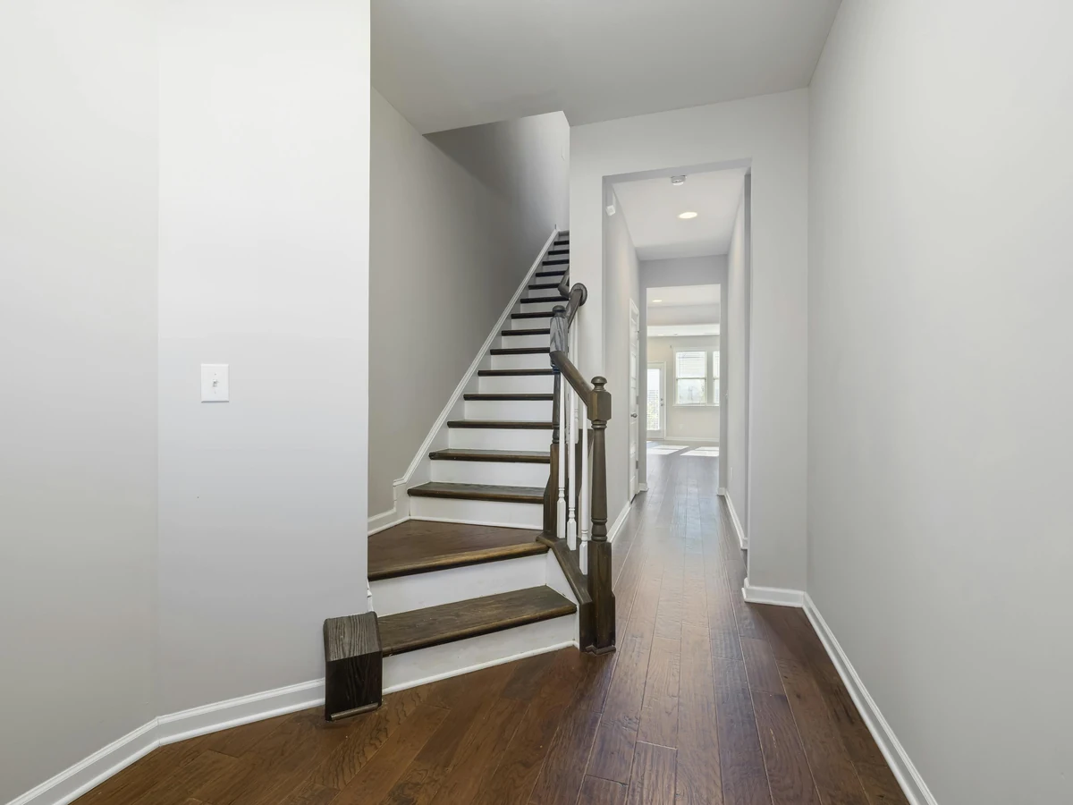 Staircase and hallway grey wall painting in Sheffield by Sheffield Decorators
